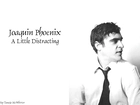 Joaquin Phoenix,biała koszula, krawat