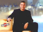 George Clooney,martini, czarny strój