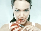 Angelina Jolie, jabłko, nóż