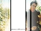 Joaquin Phoenix,czarna koszulka, pasek
