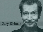 Gary Oldman,uśmiech, broda