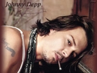 Johnny Depp,cygaro, brązowe włosy