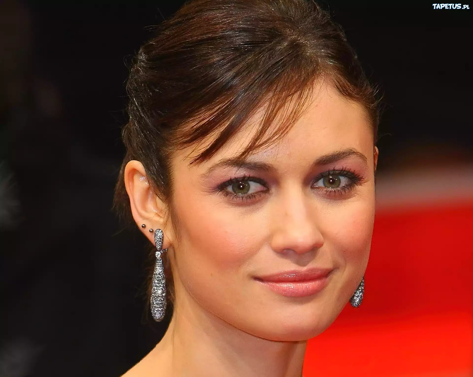 Olga Kurylenko, Twarz