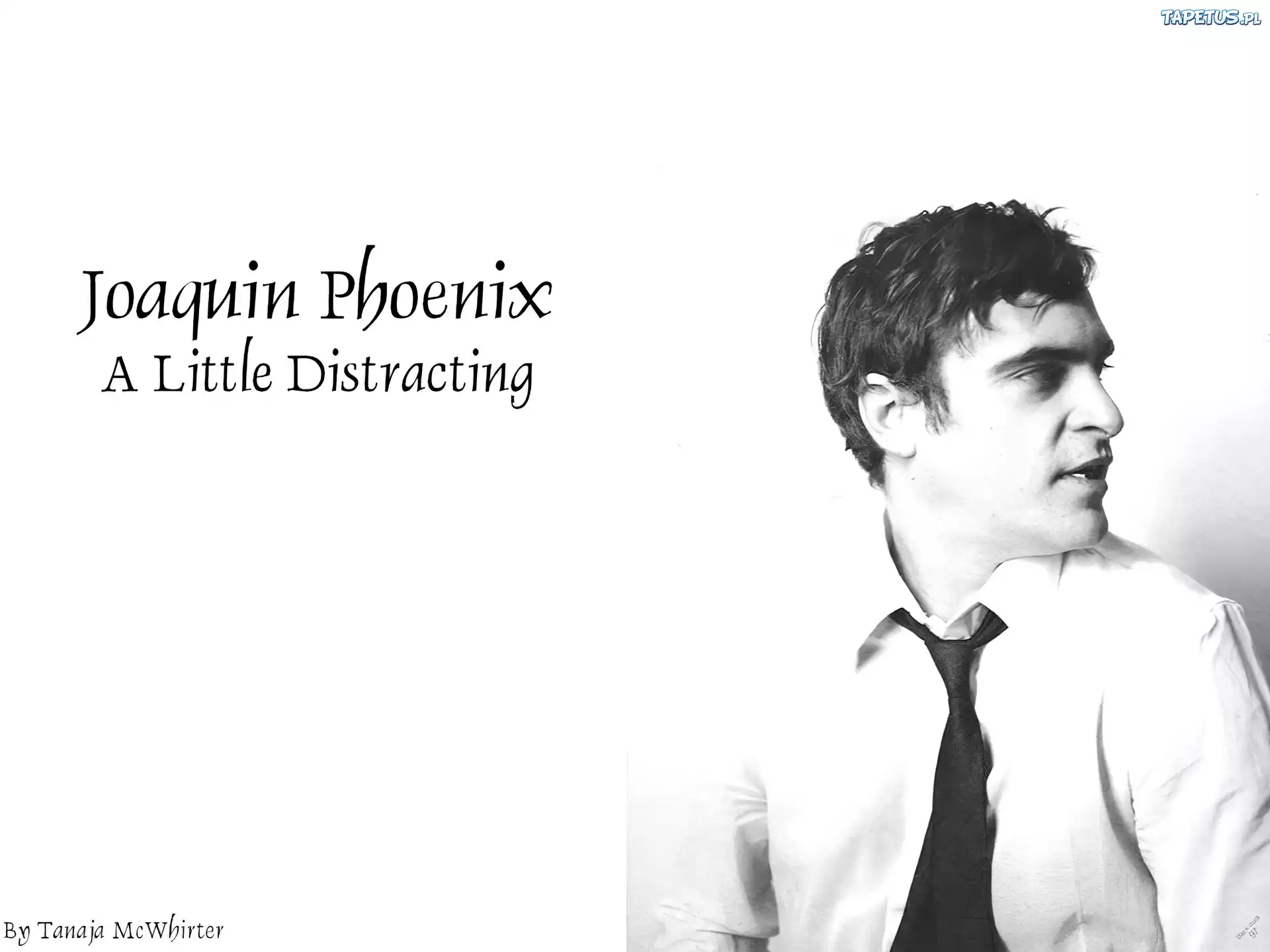 Joaquin Phoenix,biała koszula, krawat