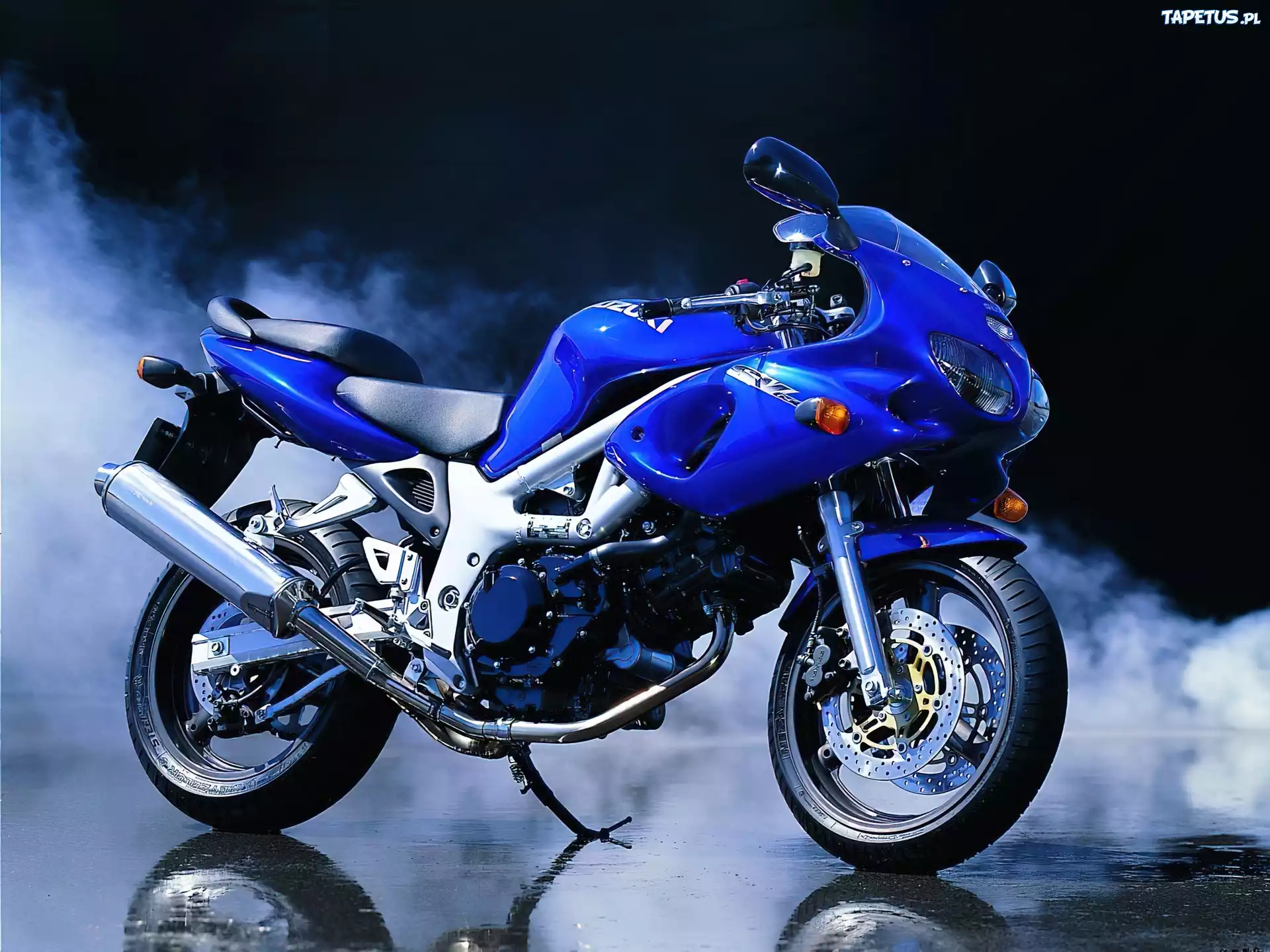 Motory Suzuki,kierownica,lusterka,tłumik , siedzenie,niebieski ,światła ,koła,opony
