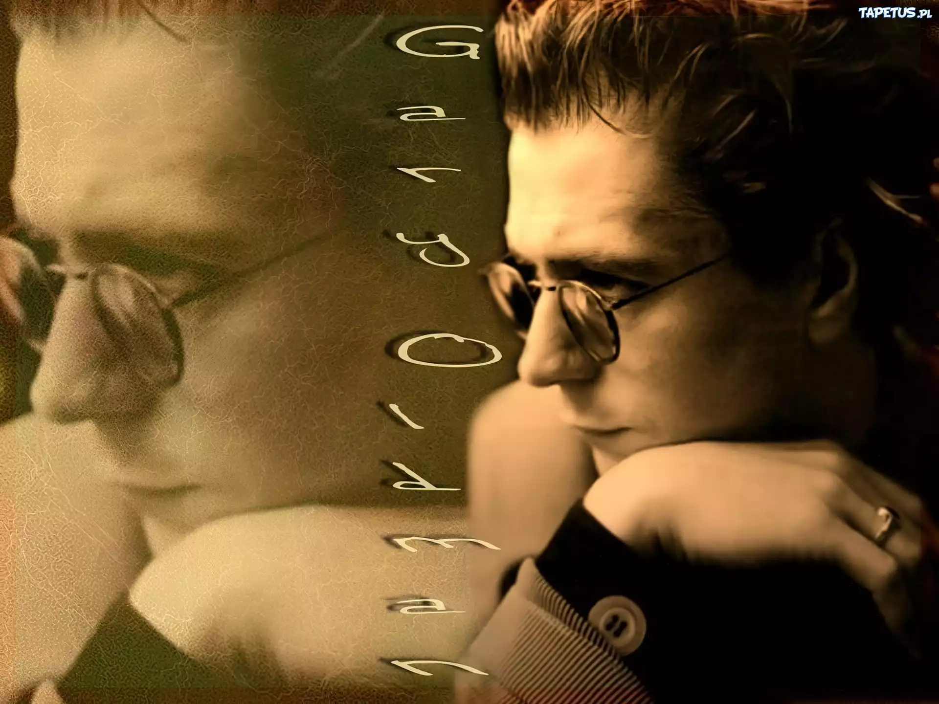Gary Oldman,okulary, sygnet
