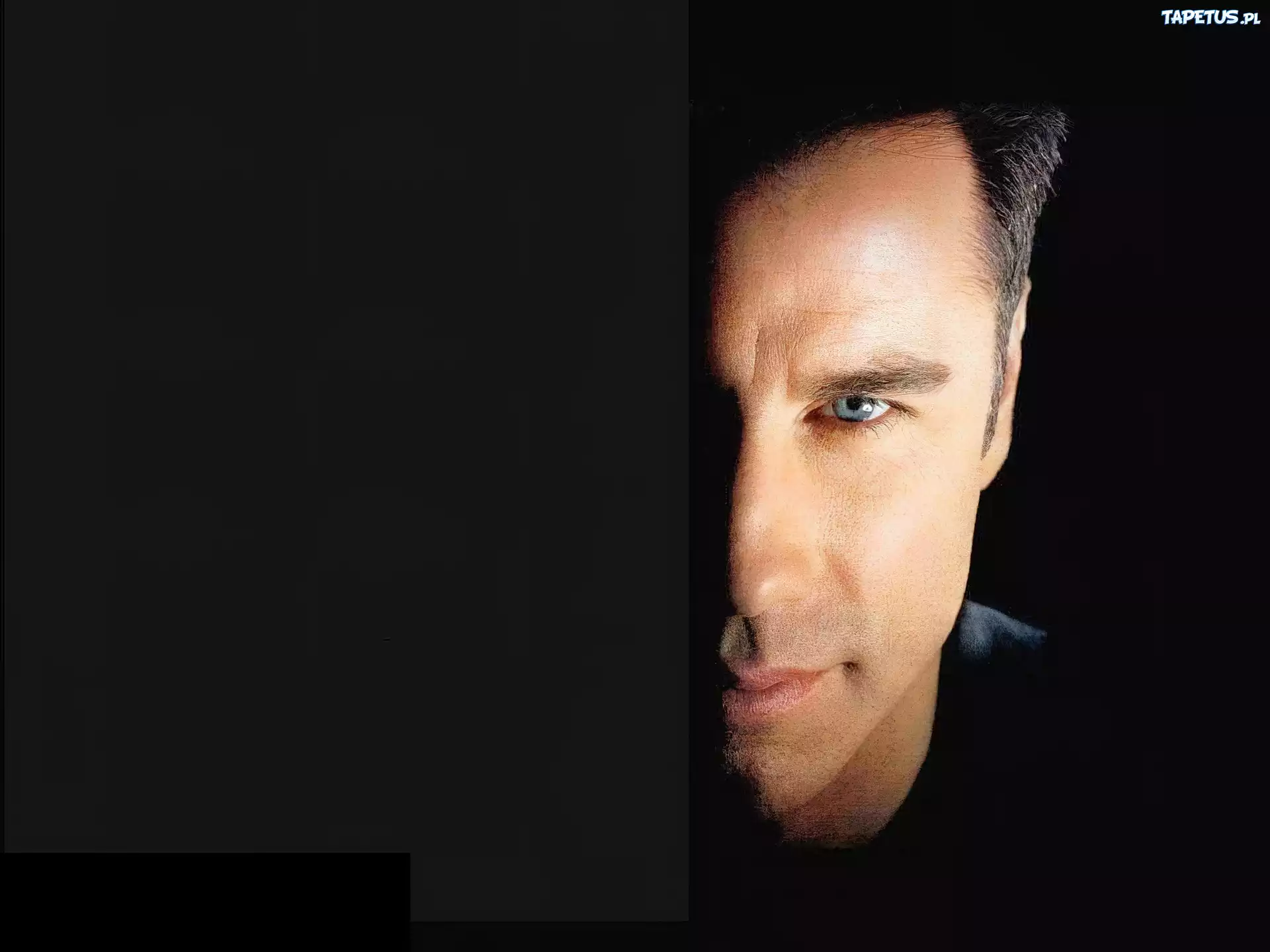 John Travolta,pół twarzy