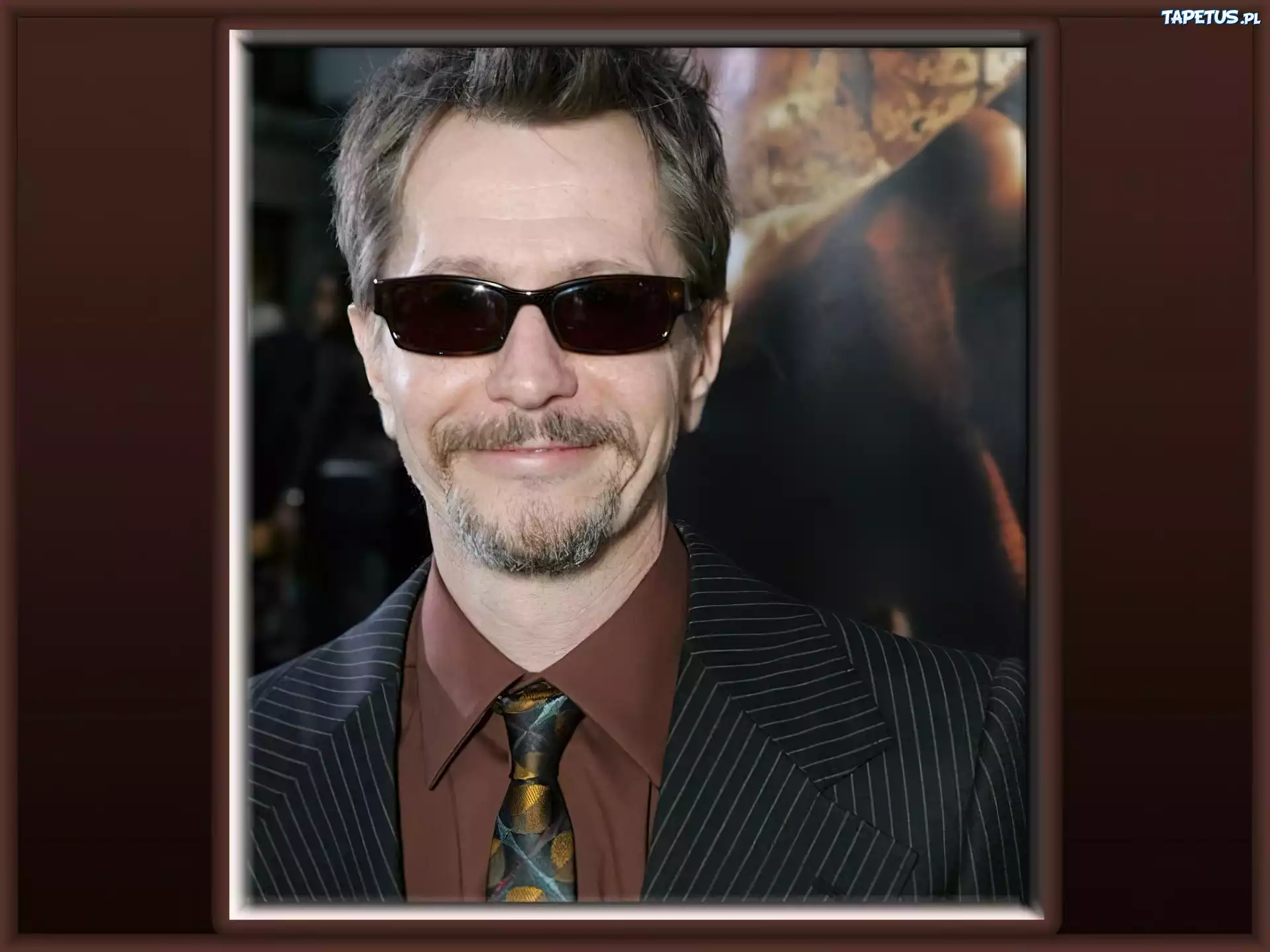 Gary Oldman,okulary, broda