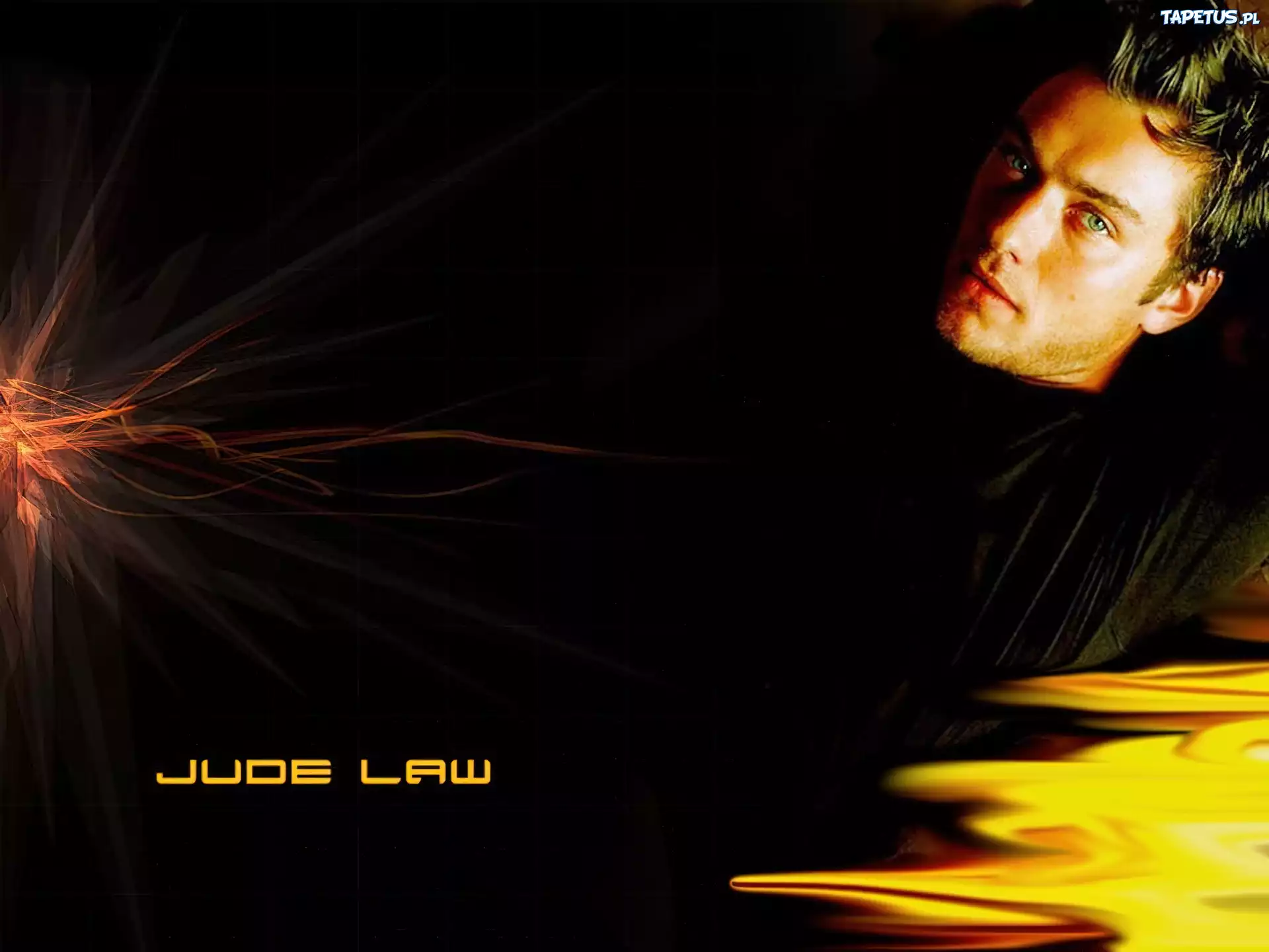 Jude Law,niebieskie oczy, czarny strój