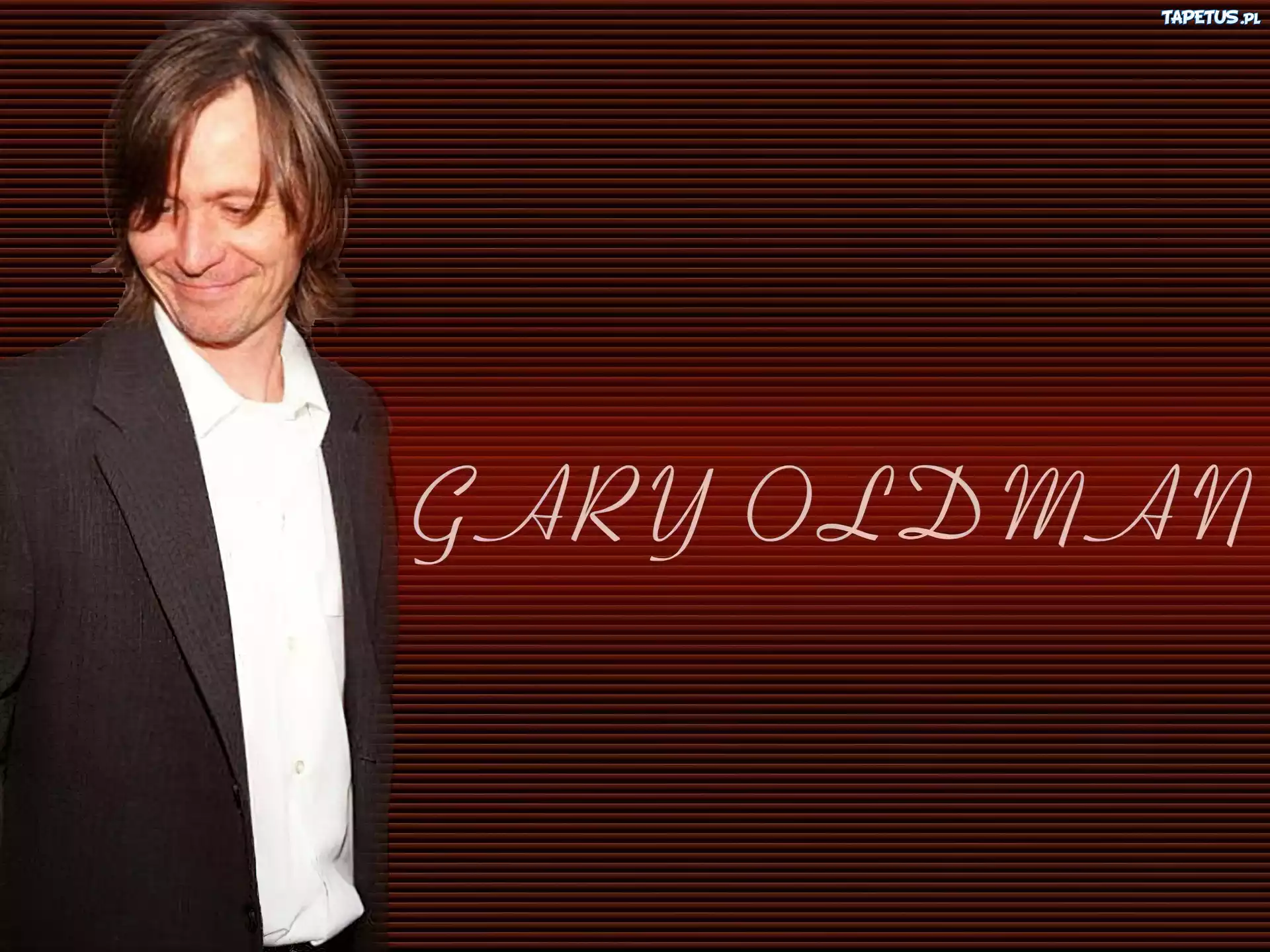 Gary Oldman,biała koszula, marynarka