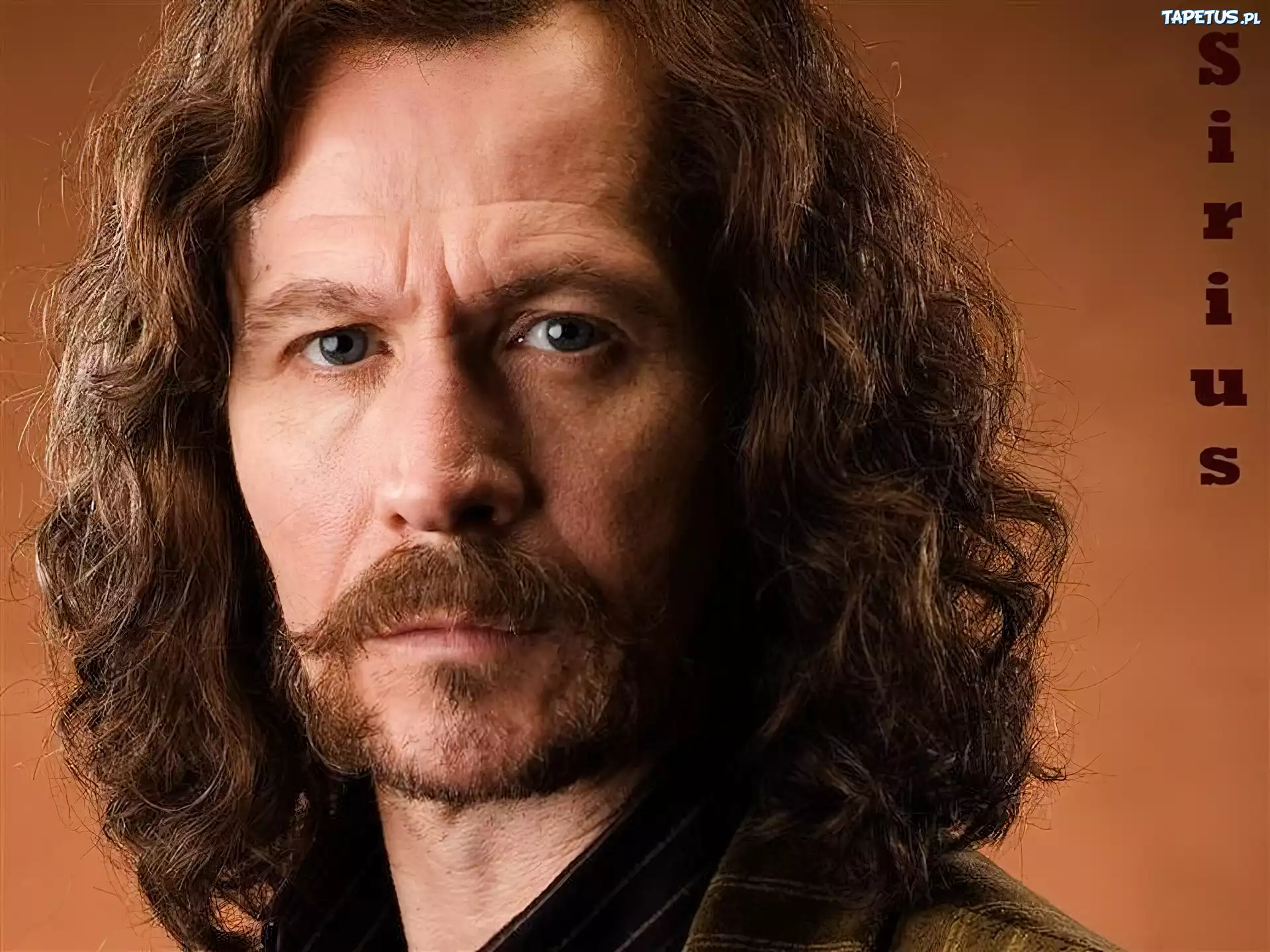 Gary Oldman,kręcone włosy, oczy